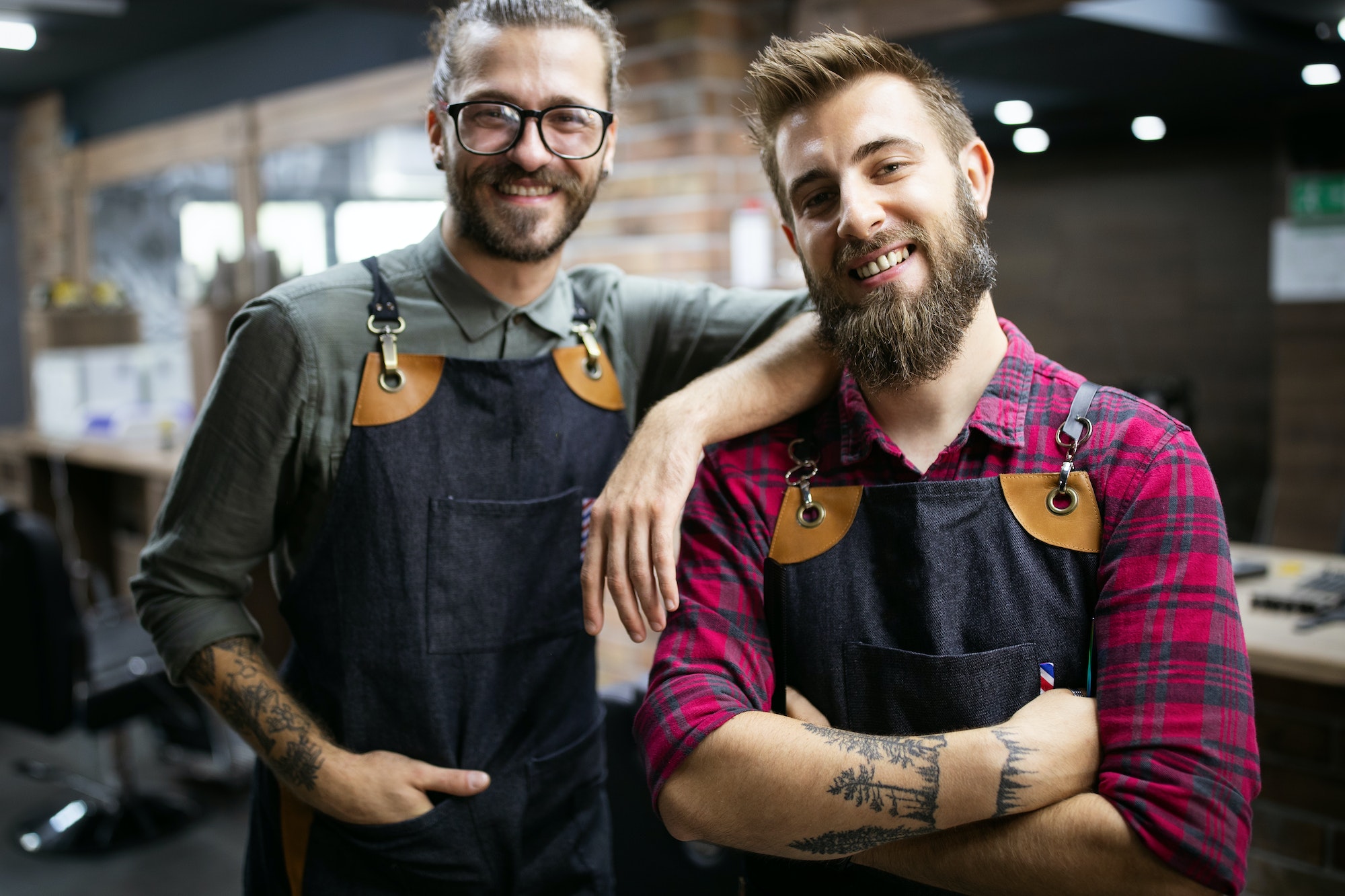 portrait-of-young-male-barbers-and-hairdressers-in-barber-shop.jpg